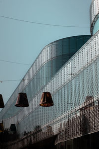 Low angle view of skyscraper against sky