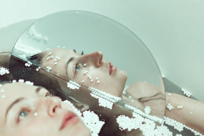 Thoughtful woman in bathtub