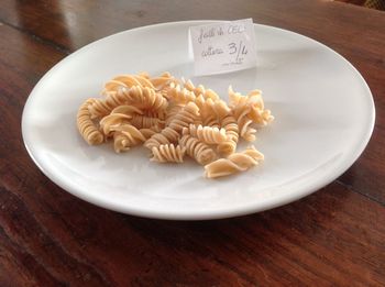 High angle view of pasta in plate on table
