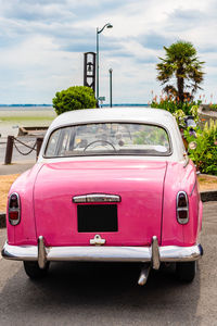 Old pink car in cancale