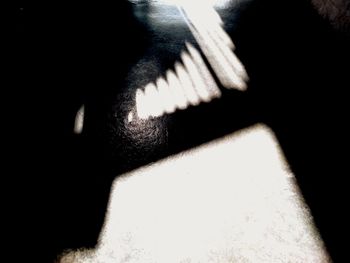 High angle view of shadow on table