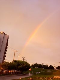 Scenic view of rainbow against sky during sunset