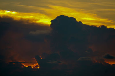 Low angle view of dramatic sky during sunset