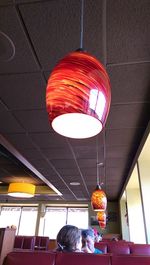 Low angle view of illuminated ceiling