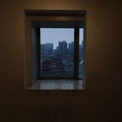 Buildings seen through window