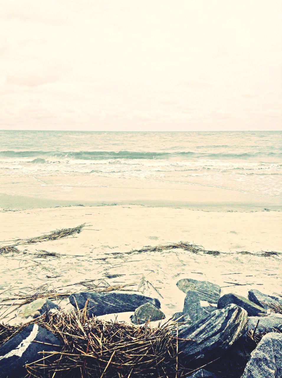 sea, beach, horizon over water, shore, water, sand, tranquil scene, tranquility, scenics, clear sky, beauty in nature, nature, coastline, wave, sky, copy space, idyllic, high angle view, day, outdoors