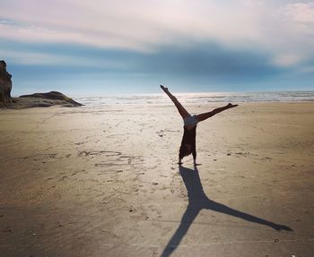 Cartwheel joy beach orehon sand happy