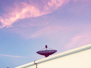 Low angle view of telephone pole against sky