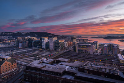 High angle view of cityscape against sky during sunset