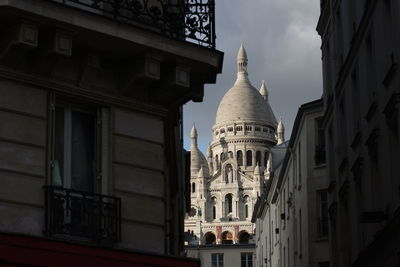 Low angle view of buildings against sky