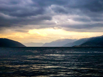 Scenic view of sea against sky during sunset