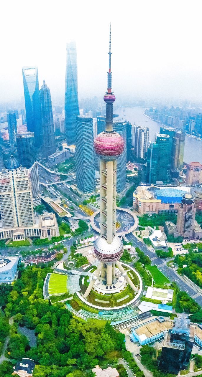 HIGH ANGLE VIEW OF CITY BUILDINGS AGAINST SKY