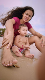 Mother and son on the beach