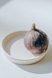 Close-up of strawberry over white background