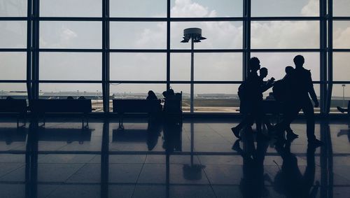 Silhouette benches at airport lobby