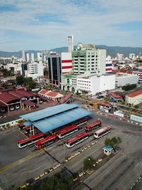 High angle view of street amidst buildings in city