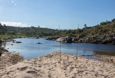 Scenic view of beach against sky