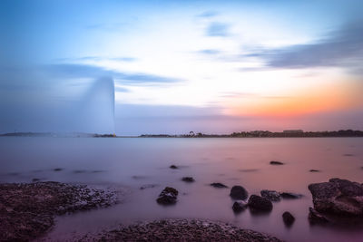 Scenic view of sea against sky during sunset