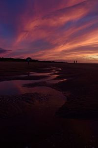 Scenic view of dramatic sky over sea