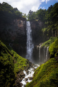 Scenic view of waterfall in forest