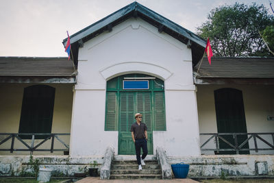 Man standing outside building