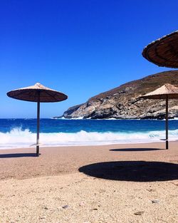 Scenic view of beach against clear sky