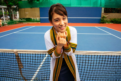 Young woman playing tennis