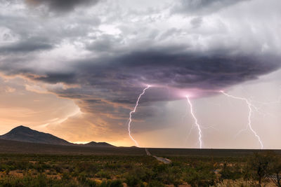 Lightning strikes as a powerful thunderstorm sweeps through las cruces, new mexico.