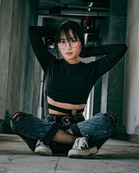 Portrait of a girl sitting on table