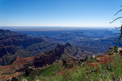 High angle view of landscape against clear blue sky