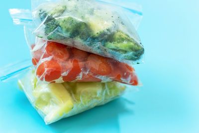 Close-up of food served against blue background