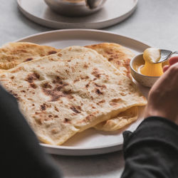 High angle view of man having breakfast