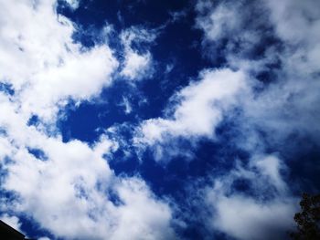 Low angle view of clouds in blue sky