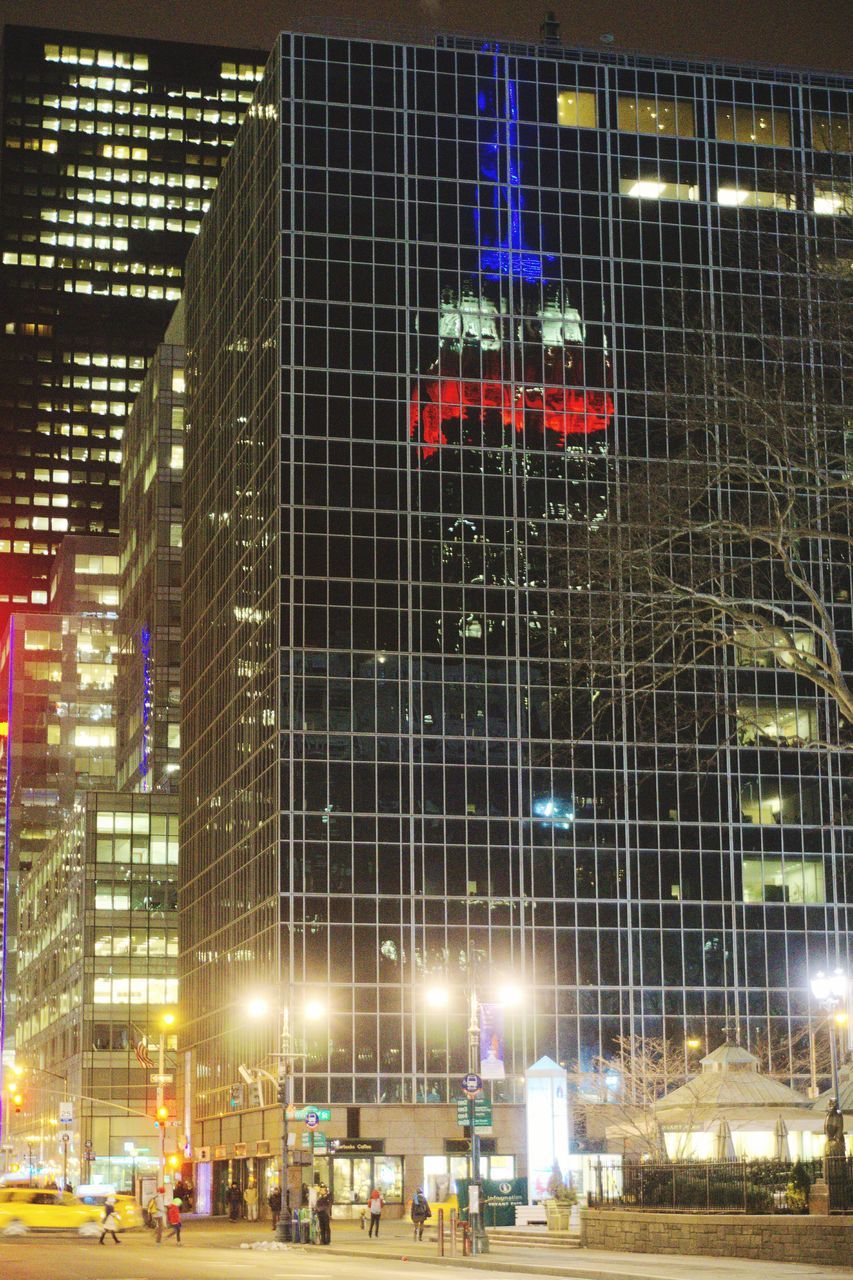 building exterior, illuminated, built structure, architecture, night, city, lighting equipment, outdoors, street light, no people, street, land vehicle, building, light - natural phenomenon, incidental people, city life, construction site, car, chair