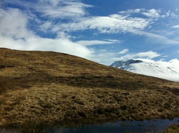 Scenic view of mountain landscape against sky