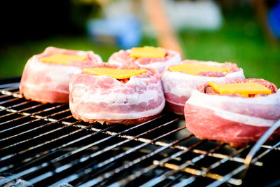 Close-up of meat on barbecue grill