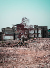 Abandoned building against clear sky