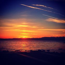 Scenic view of sea at sunset