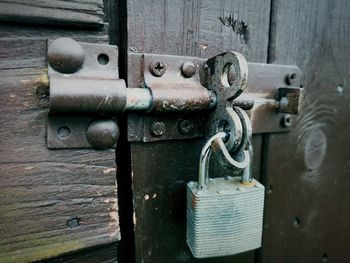 Close-up of padlock on door