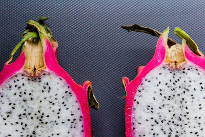 Close-up of fruit against pink background