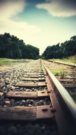 Railroad tracks on landscape