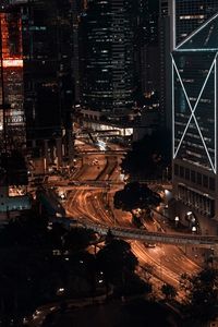 High angle view of city lit up at night