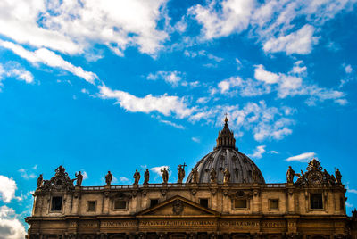 Low angle view of historical building against cloudy sky