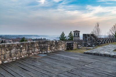 Sunset on the ancient castle of ragogna, italy. fortress guarding the ford on the river tagliamento