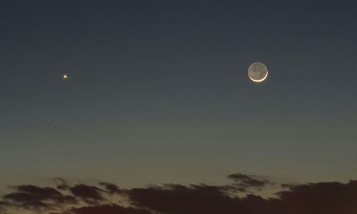 Low angle view of moon in sky