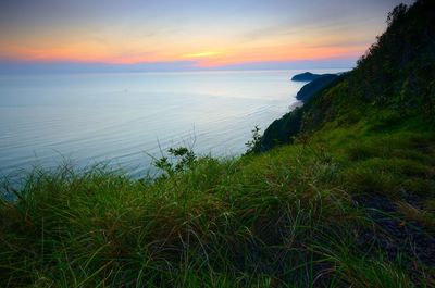 Scenic view of sea against sky during sunset