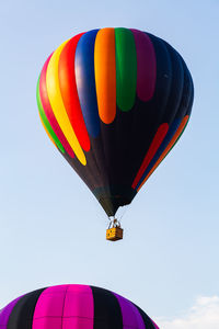 Low angle view of hot air balloon flying in sky