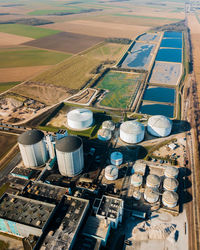 High angle view of storage tanks on land