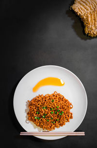 High angle view of vegetables in plate on table