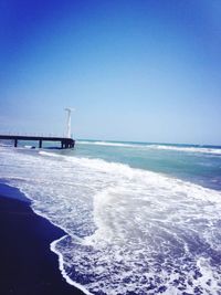 Scenic view of sea against clear sky